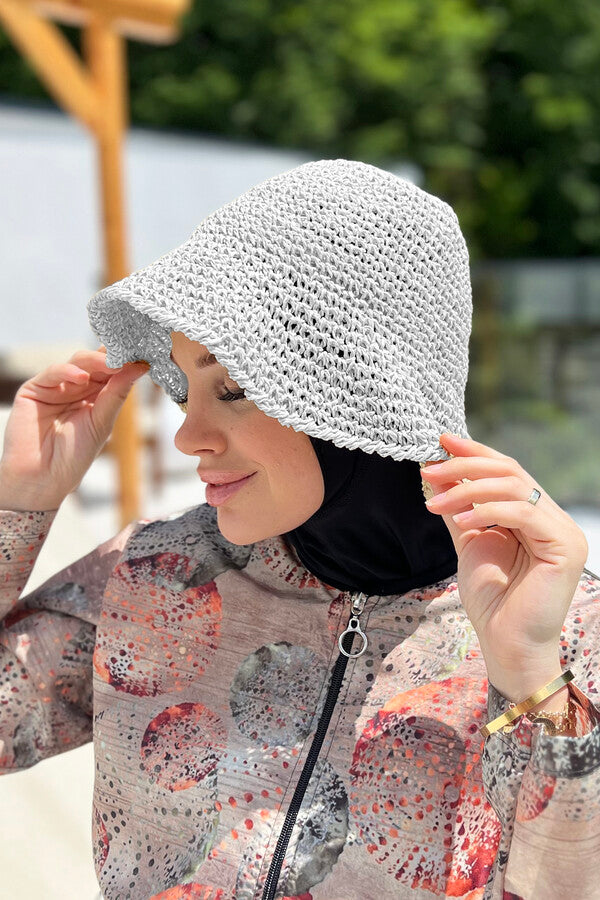 white hat knitted